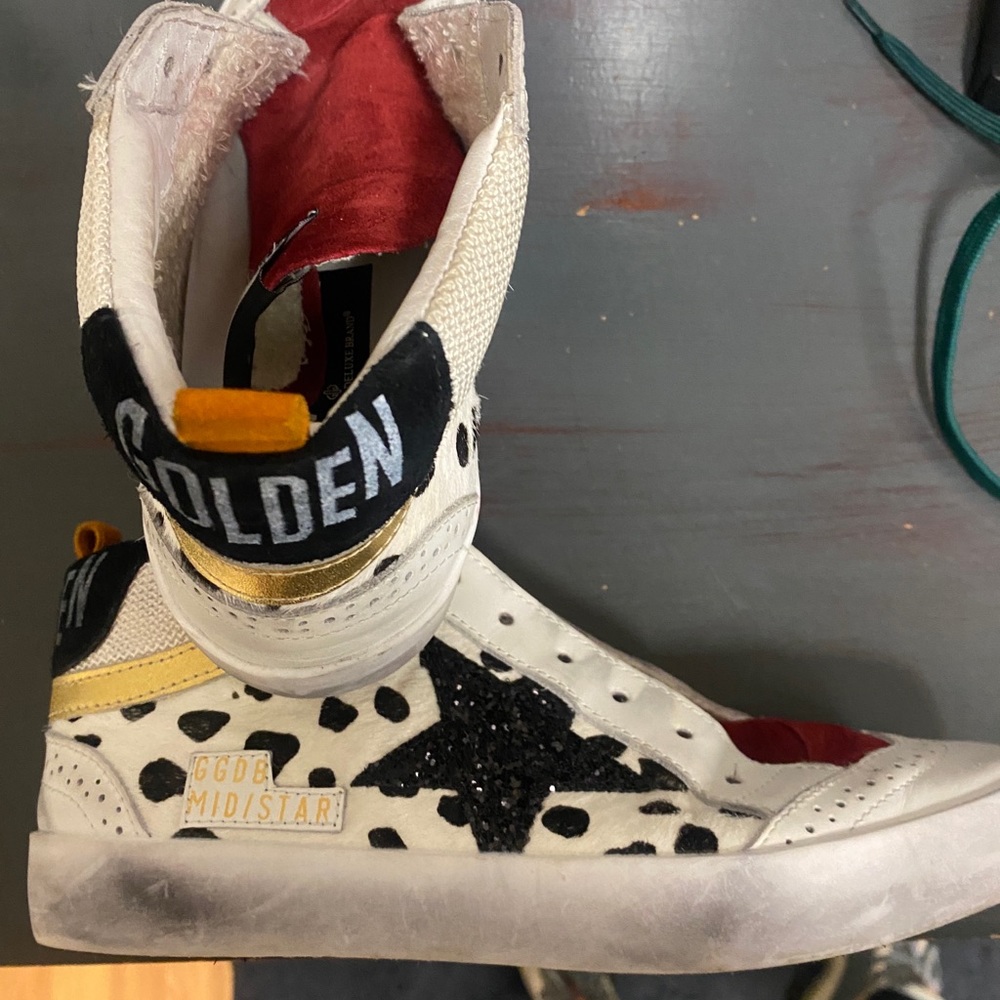 Golden goose tennis shoes. I am unsure if they are real.